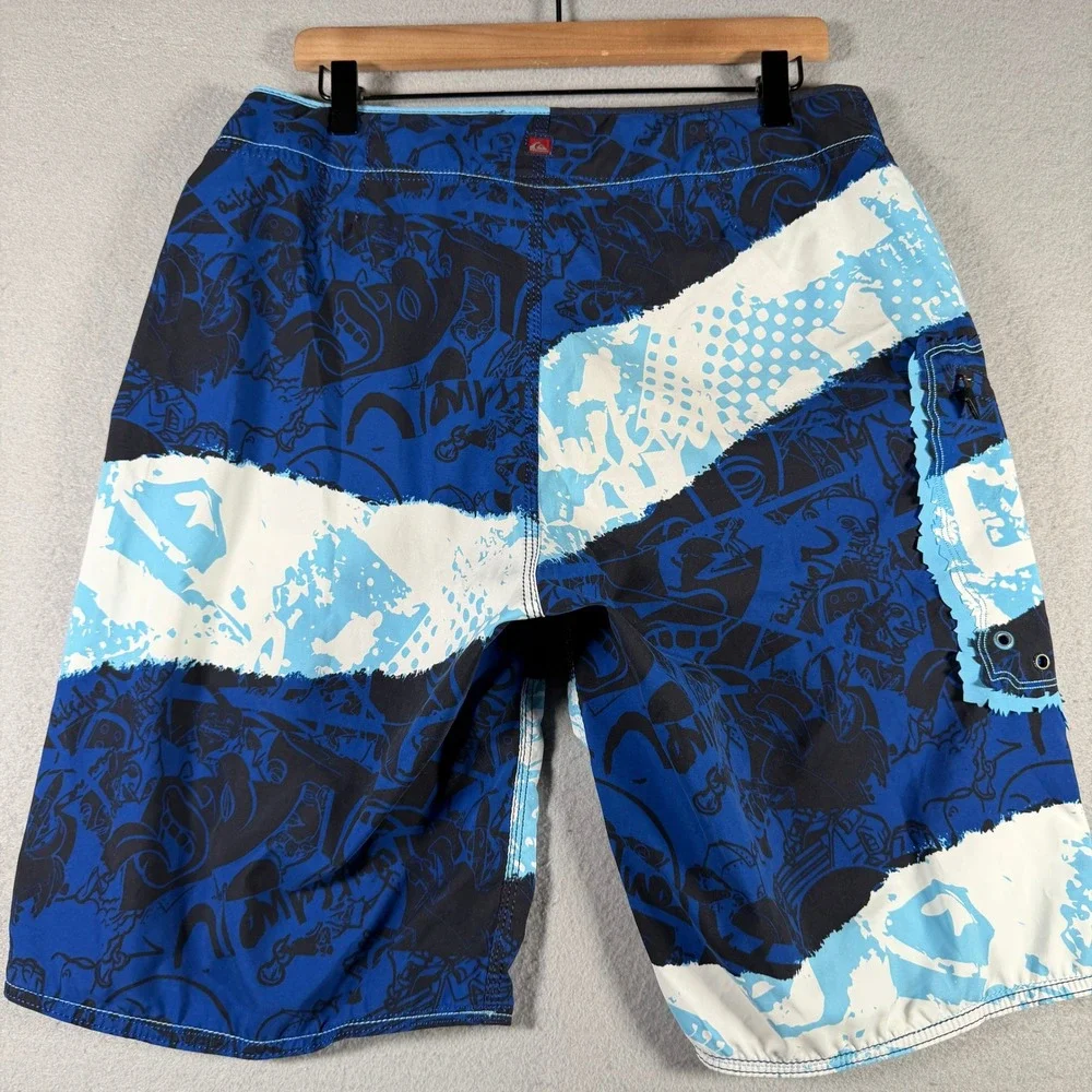Vintage Quiksilver Mens Blue Graphic Print Board Shorts Size 34 Surf Swim Trunks
